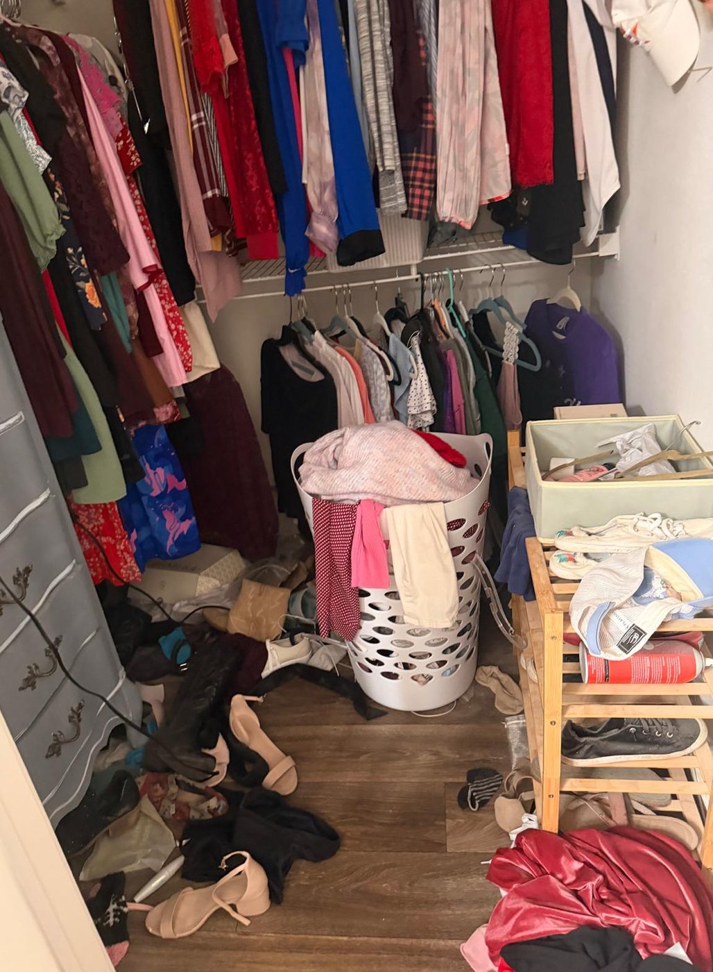 Overflowing walk-in closet before organizing, Houston home, Texas Nova Cleaning